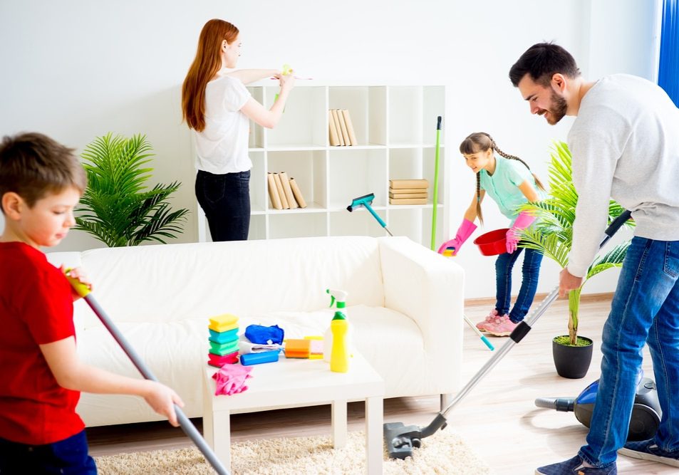 Family cleaning the house